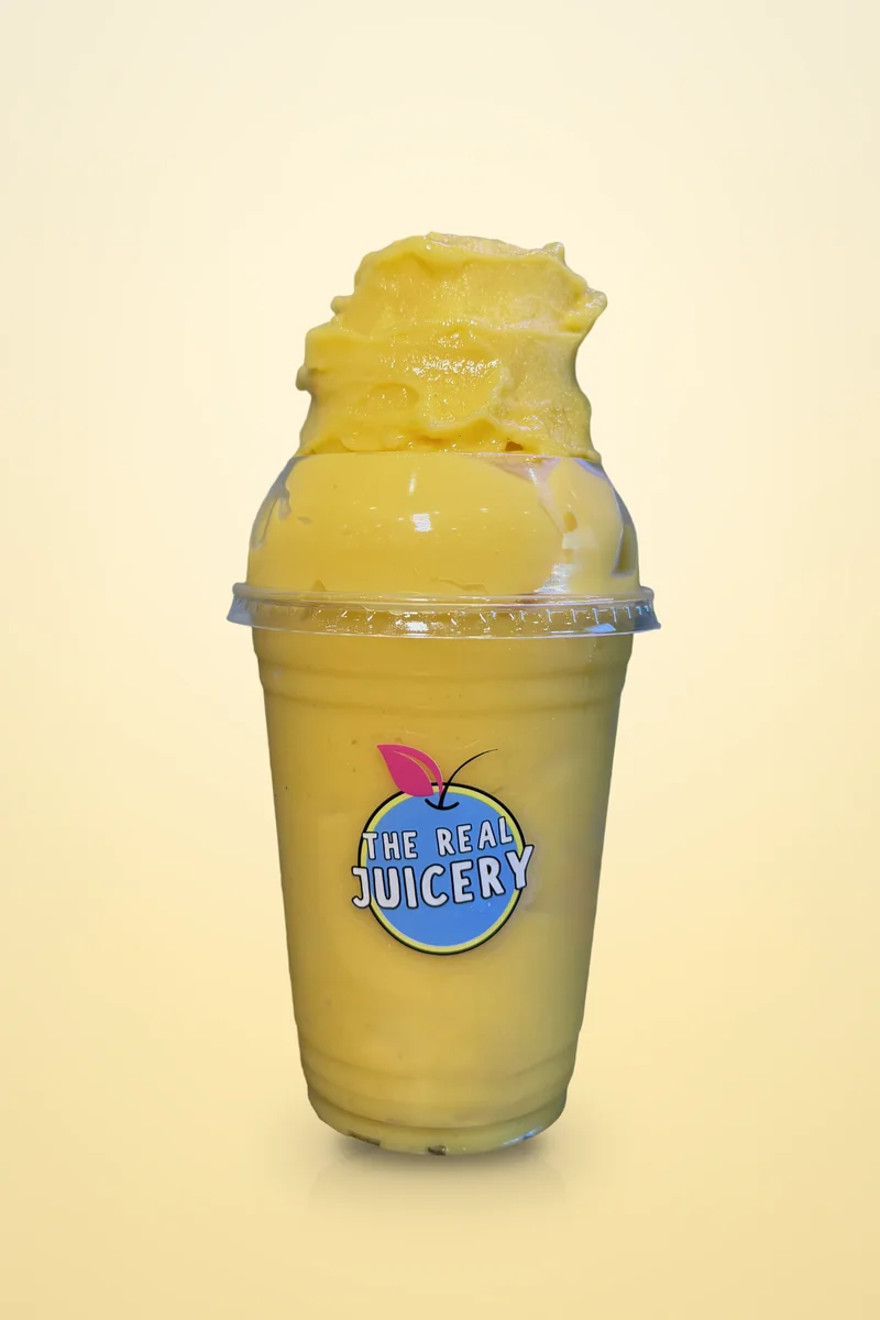 Mango Overfill smoothie, filled over the top of the cup